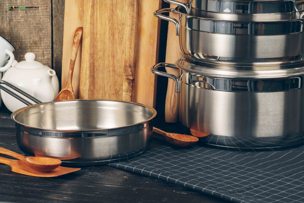 Set of stainless steel saucepans in a kitchen